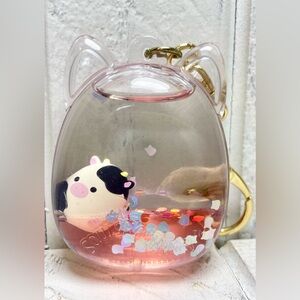 Squishmallows Tsunameez Connor The Cow Pink Water Filled Collectible Keychain